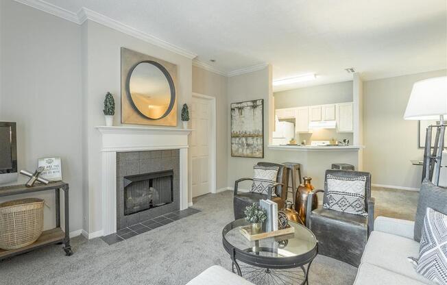 a living room with a fireplace and a couch