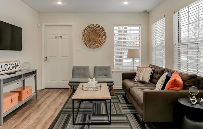 Living Room With TV at Aspen Landing, Kansas City, MO