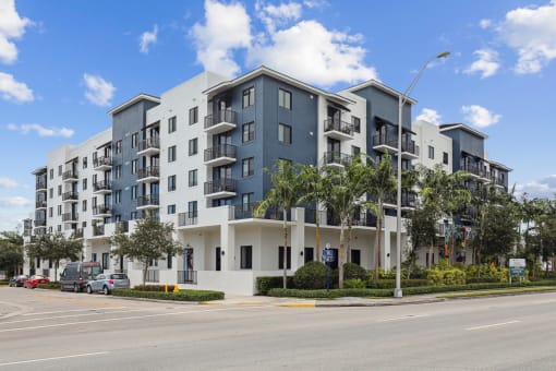 Side view of our beautiful apartment building at Bay Village 1 in Palmetto Bay, FL