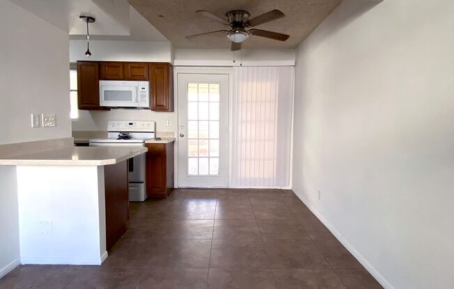 Great 3 bedroom and 1.5 bath townhouse with a small yard and 2 car garage.