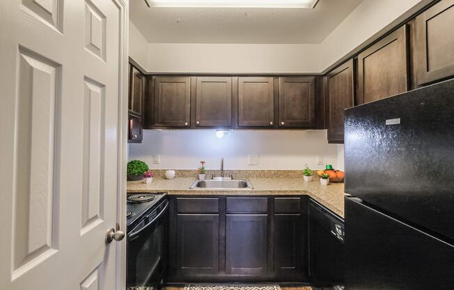 a modern kitchen with stainless steel appliances