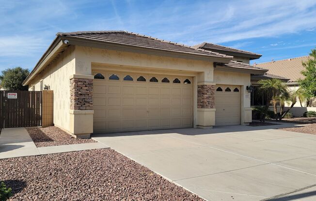 Gated community in Litchfield Park! SOLAR, Pool, and 3 car garage!