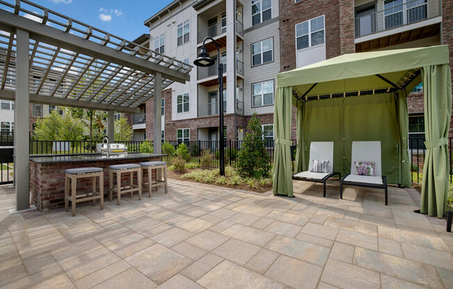 Private cabanas & Outdoor kitchen at Apartments @ Eleven240, Charlotte, North Carolina