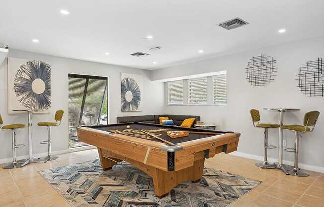 Community Clubhouse Game Tables at Grand Pavilion Apartments in Tampa, FL.