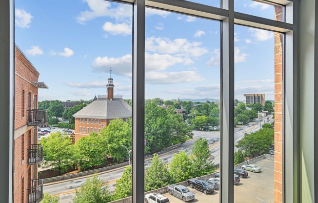 a view of a city from a window of a building