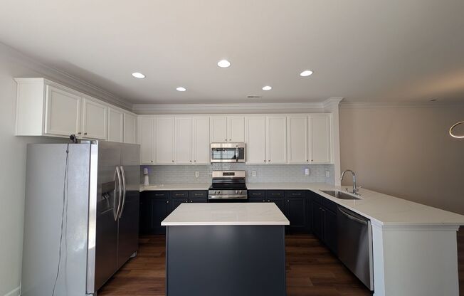 Pristine End Unit Townhome located in the Prosperity Place community!