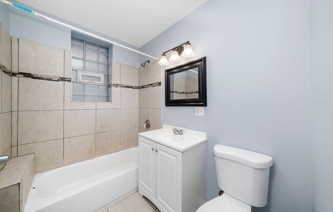 6553-6555 S Martin Luther King Dr [400-410 E 66th St]