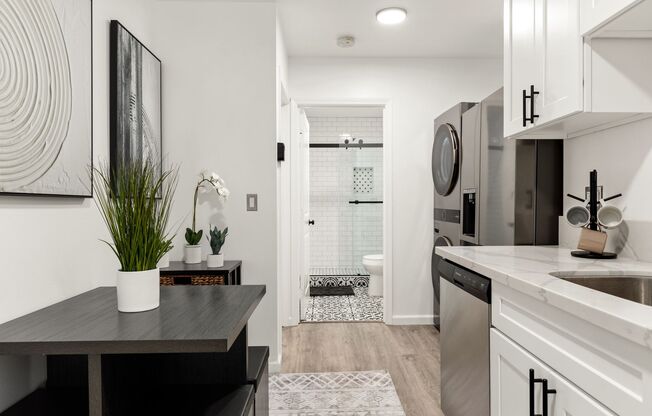 A 2 Bedroom, 1 Bathroom apartment with common areas and a fully functional kitchen at 1702 Malcolm Ave.