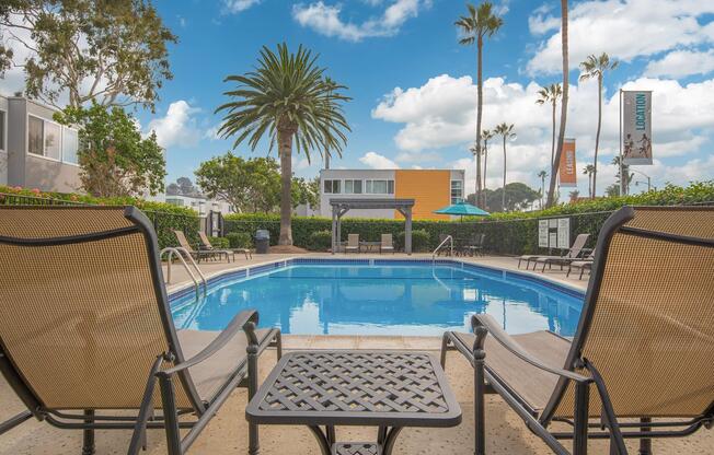 a chair sitting in front of a pool