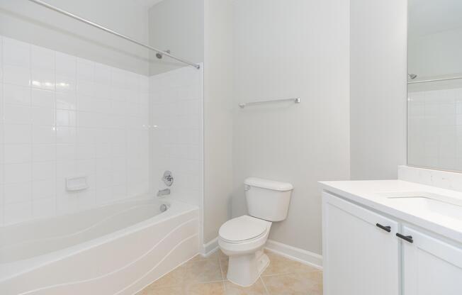 a room with a sink and a shower