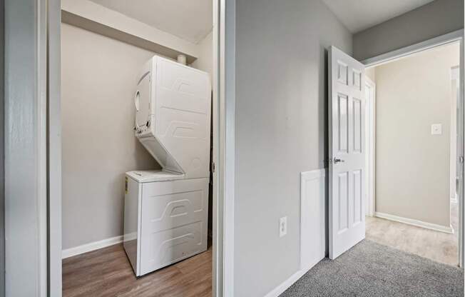 a laundry room with a washer and dryer at ReNew Odenton