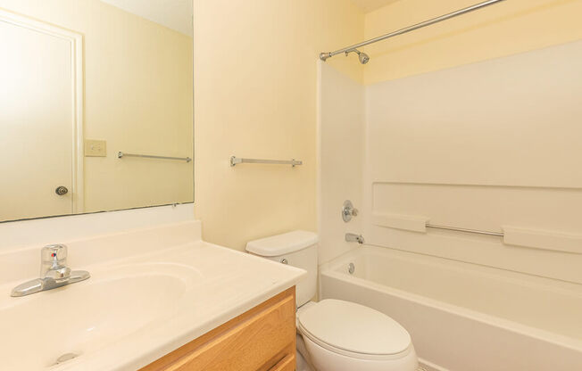 Bathroom with shower tub at Greens of Pine Glen in Durham NC