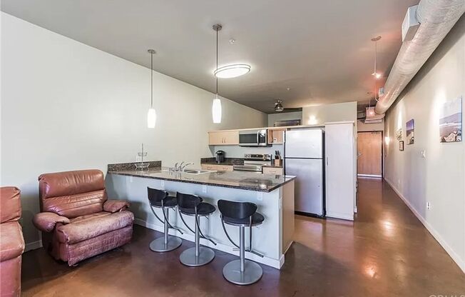 Upgraded Modern 1 Bed/1 Bath Loft Style Condo at The Lofts!