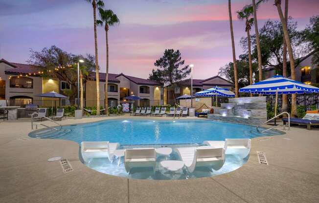As twilight descends, our renovated pool transforms into a magical oasis, beautifully illuminated by soft, ambient lighting.