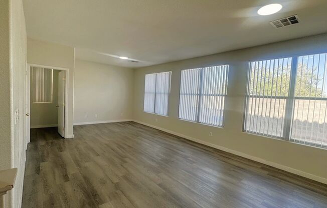 A SPACIOUS 2 STORY 4 BEDROOM 2.5 BATHROOM HOME LOCATED WITHIN THE GATED COMMUNITY OF CACTUS SPRINGS NEARBY MANY SHOPPING CENTERS AND NEAR THE 215. A MUST SEE!!