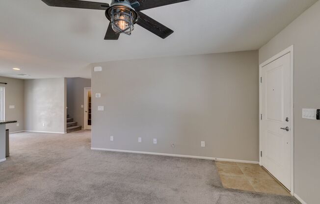 3-bedroom home featuring granite countertops, stainless steel appliances, and a covered backyard patio!