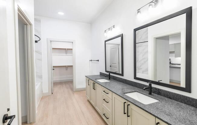 Upgrade your routine with bathrooms featuring double vanities, sleek granite countertops, and designer matte black plumbing fixtures.
