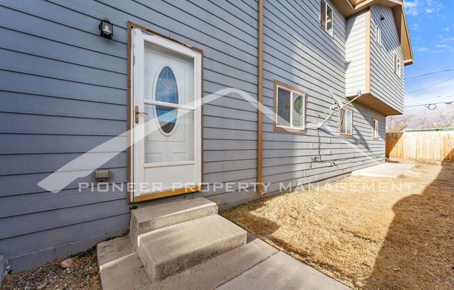 Lower Level Half Duplex with Two Car Garage and Fenced Yard