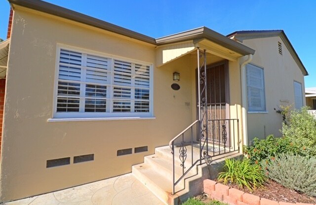 Beautiful 2 Bedroom, 1 Bath Talmadge Home with Hardwood Floors - Great Curb Appeal!
