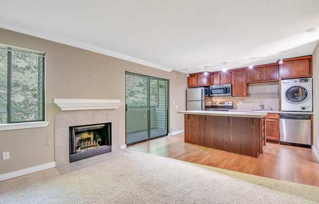 Living Room with Fireplace at Whispering Brook Apartments, Des Moines,98198