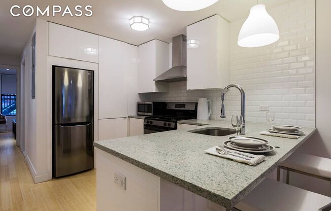 13 W 127 ST