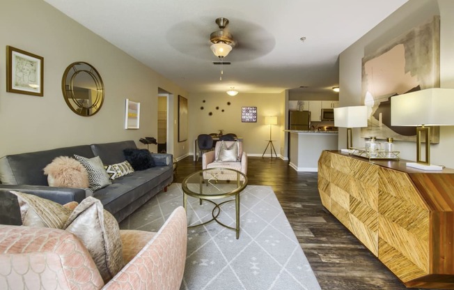 a living room with couches and a coffee table