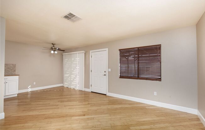 Two bedrooms on the second floor of henderson townhome with garage, granite counters and wood floors