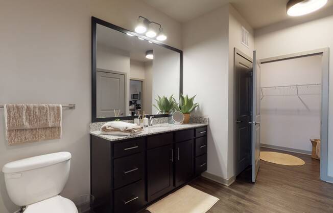 Bathroom With Vanity Lights at The Address Galleria, Matthews