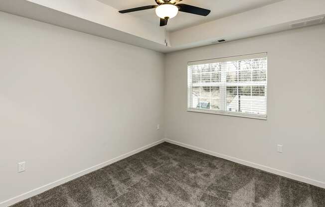 New building with white and dark color schemes with one, two and three bedroom apartment homes at CopperCreek Apartments in Council Bluffs, IA