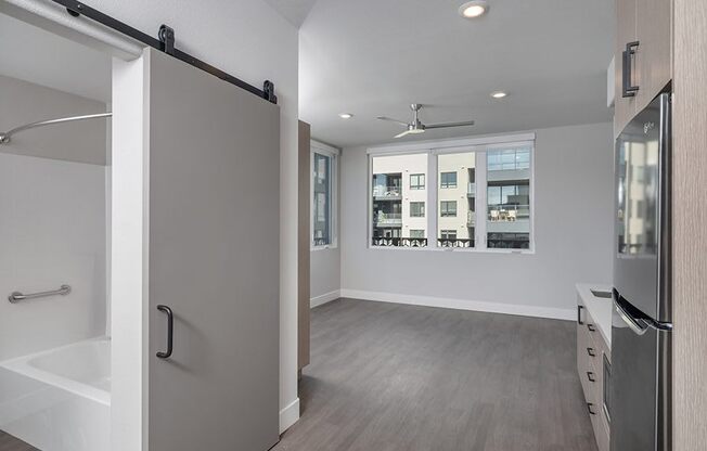 a bathroom with a shower stall and a bathtub
