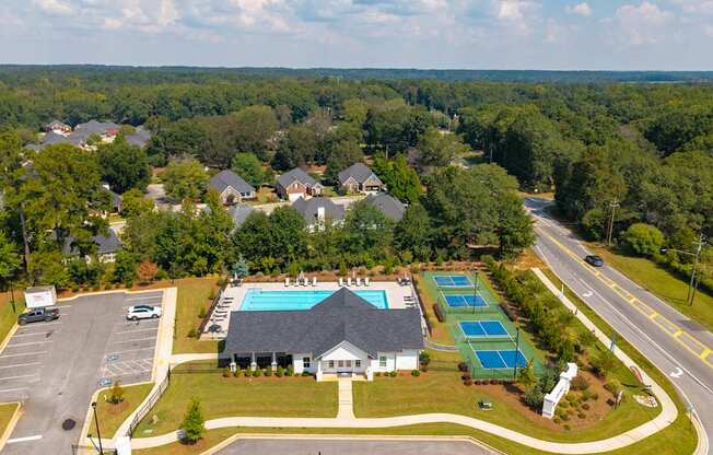 Bird’s-eye view showcasing the clubhouse and surrounding amenities.