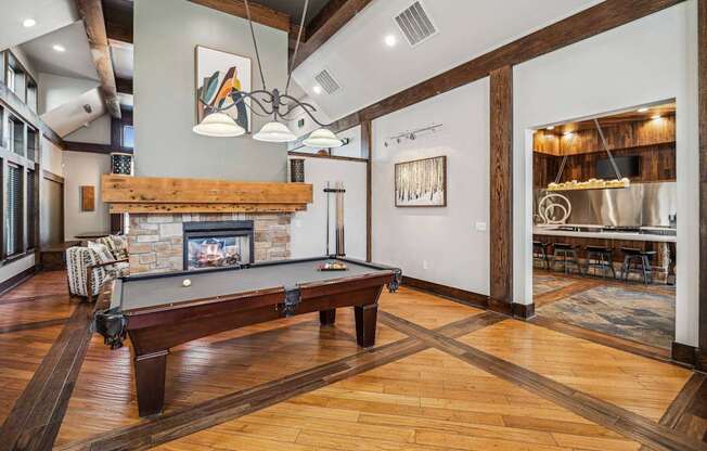 social area with billiards at Berkshire Aspen Grove apartments
