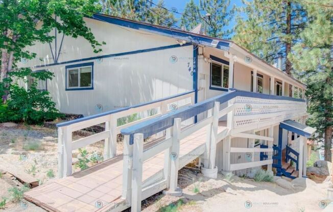 Amazing special of 1 month free!! Nestled in the heart of Lake Tahoe, this three-bedroom, two-bathroom home offers an idyllic escape.