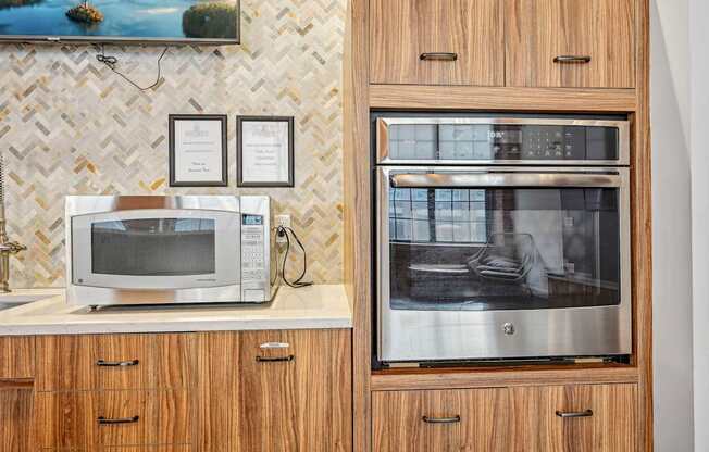 a kitchen with a microwave and a toaster oven