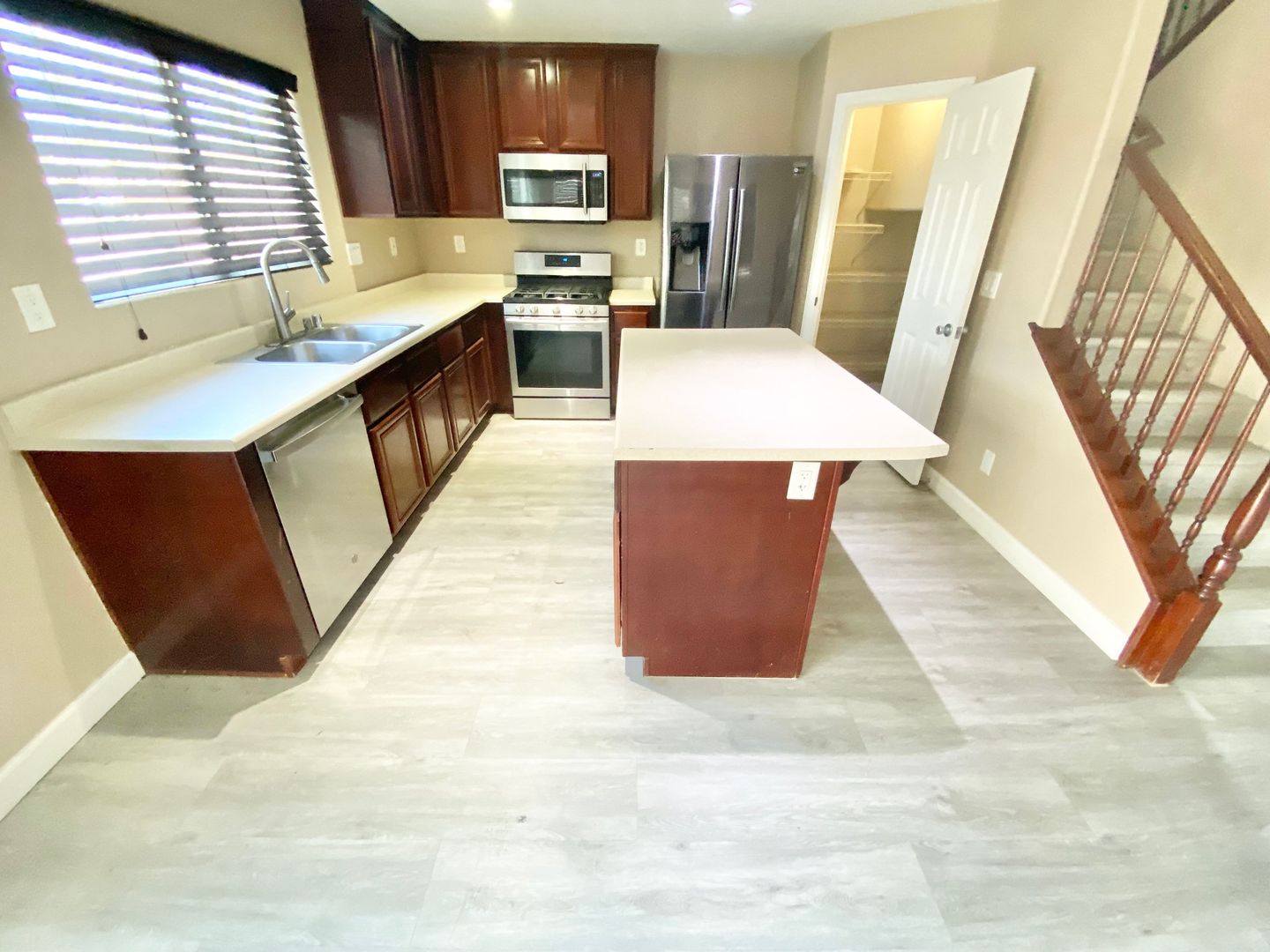 STUNNING 2 STORY HOME 3 BEDROOM 2.5 BATH W/ ONE CAR GARAGE IN A GATED COMMUNITY!