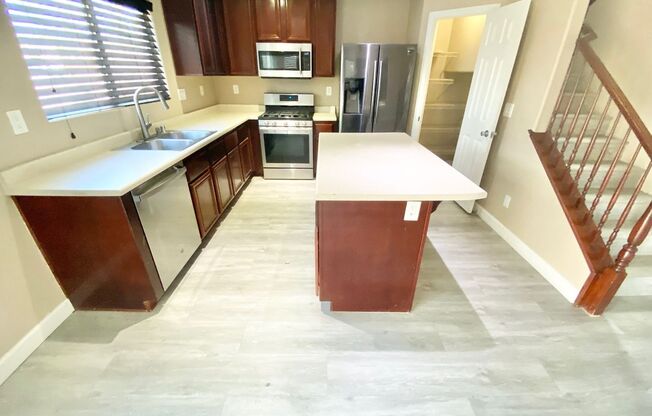 STUNNING 2 STORY HOME 3 BEDROOM 2.5 BATH W/ ONE CAR GARAGE IN A GATED COMMUNITY!