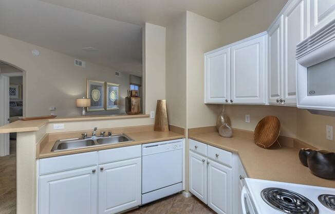 White kitchen interior at The Covington by Picerne, Nevada, 89139