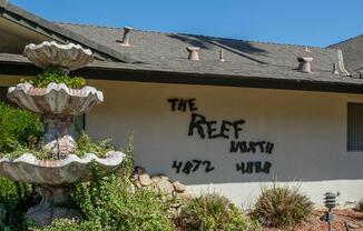 Property Signage at Reef Apartments, Fresno, 93704