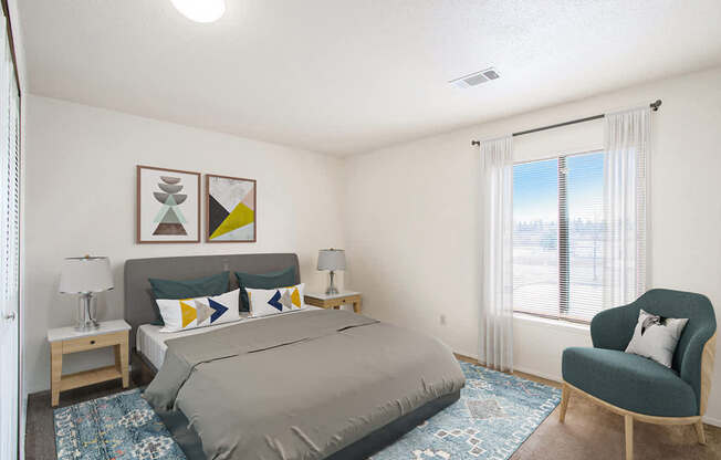 a bedroom with a large window at Seville Apartments, Kalamazoo, MI, 49009