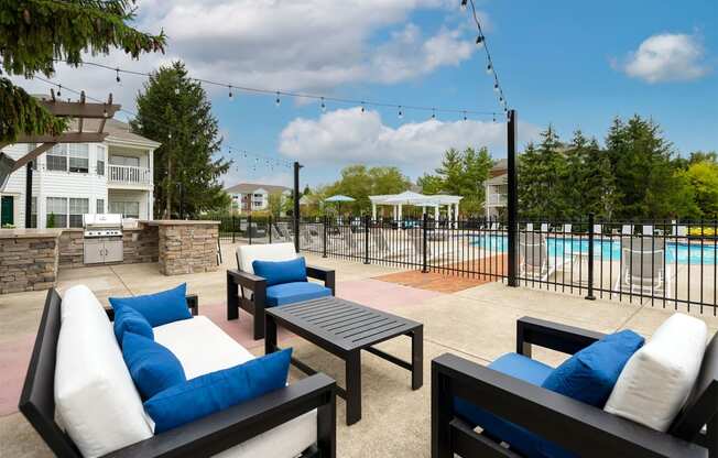 our apartments have a pool and lounge area with furniture