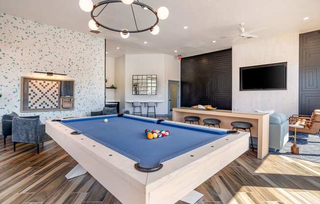 a clubhouse with a pool table and a tv at Sladestone Shadow Creek, Texas, 77584