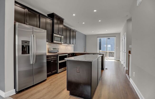 Luxury 4-Story Townhome with Rooftop Terrace!