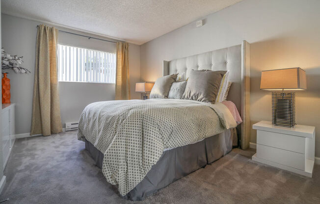 a bedroom with a bed and a window at Sunnyvale Crossings Apartments, LLC, Sunnyvale, 94087