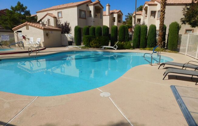 Gorgeous 3 bedroom condo with a 2 car garage! Tons of upgrades*Southwest*Gated community*