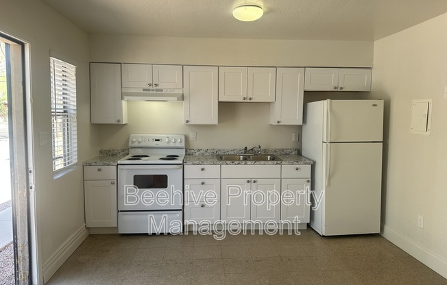 1102 E POLK ST