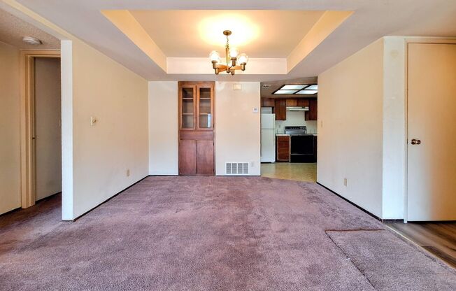 Spacious First Floor 2bd Condo With Laundry In Unit, Pool, Patio, & Carport!