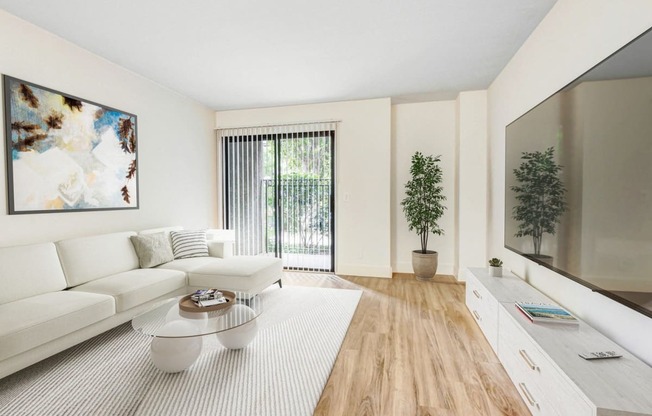 a living room with a couch and a coffee table