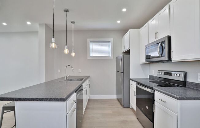 EAST FRANKLINTON ARTIST DISTRICT!  SUNNY NEWLY RENOVATED HOME on DOUBLE LOT