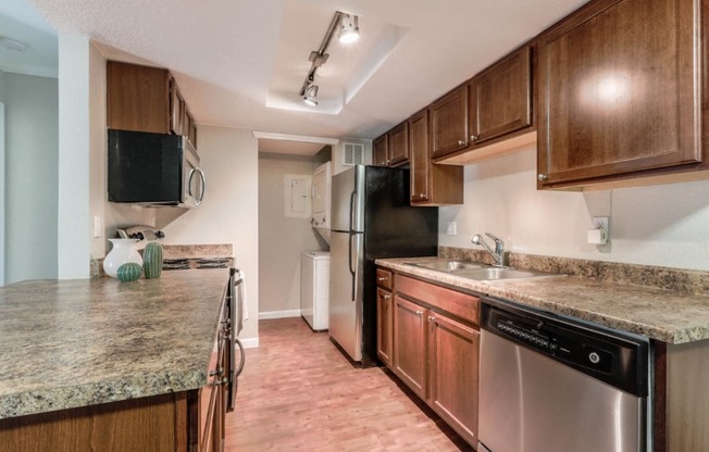 Copper Flats - Spacious Kitchen with Cherry Cabinets, Granite-Style Countertops, and Stainless Steel Appliances