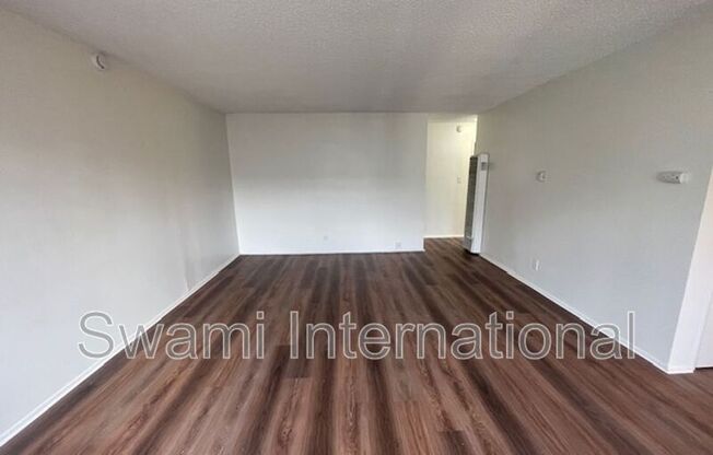 1303 W 107 ST